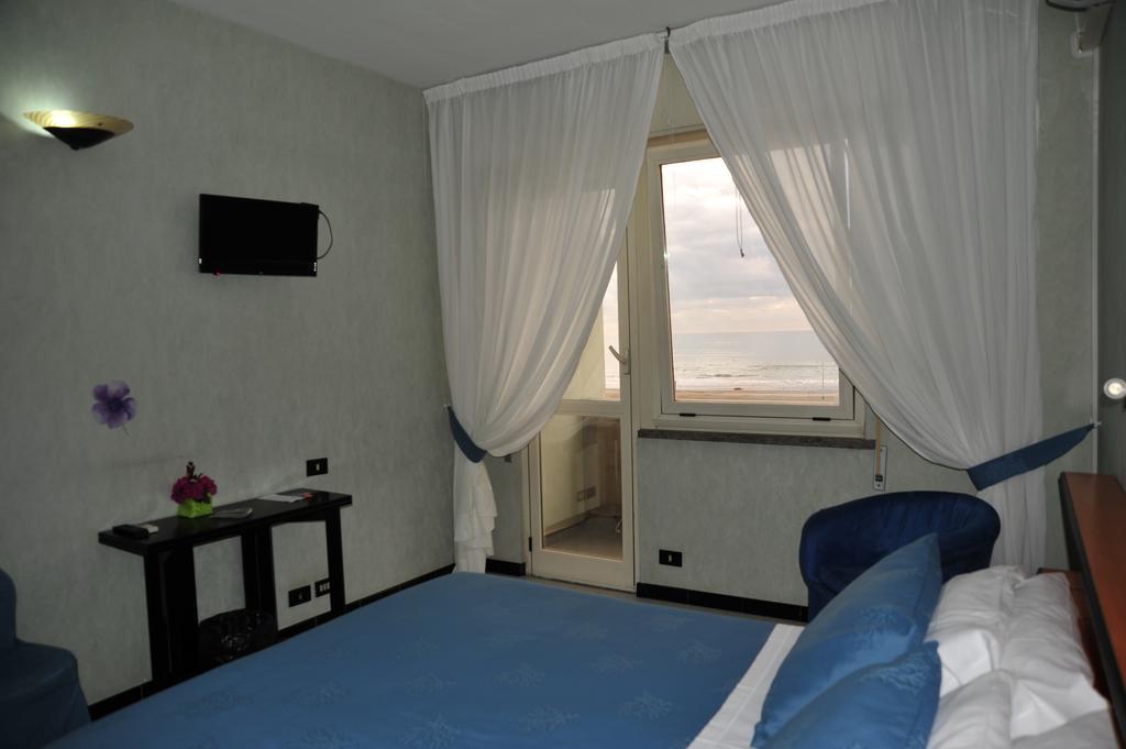 Marocca Hotel Нетуно Стая снимка