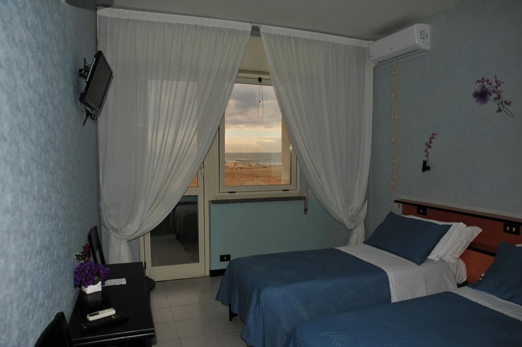 Marocca Hotel Нетуно Стая снимка