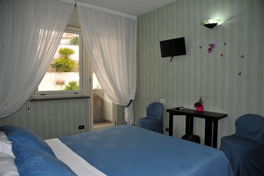 Marocca Hotel Нетуно Стая снимка